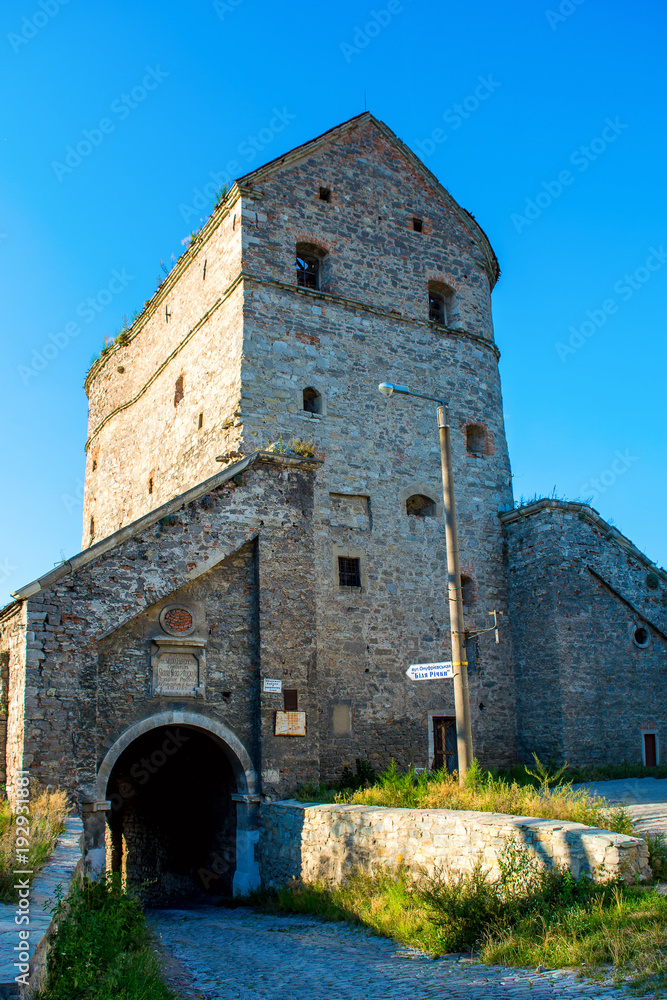 Photo of ancient stone tower of castle in Kamyanets-Podilsky