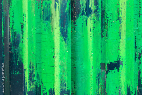 Metal fence with green and white paint  background  texture