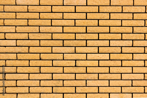 Brick wall. The brick wall painted in yellow