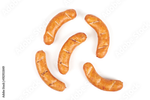 Grilled chicken sausages isolated on a white background