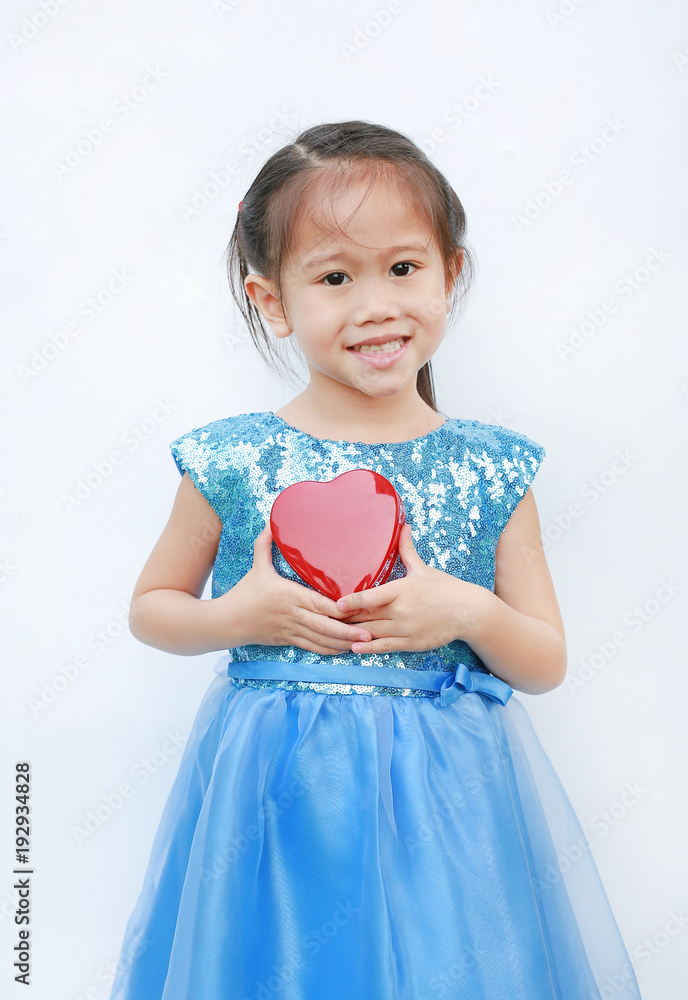 Smiling little child girl with holding red heart isolated on white background. Concept Valentine's Day. Smiling little child girl with holding red heart isolated on white background. Concept Valentine's Day.