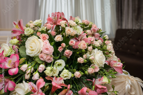 Flower composition close up. Beautiful bouquet in pastel shape. Flower arrangement with roses