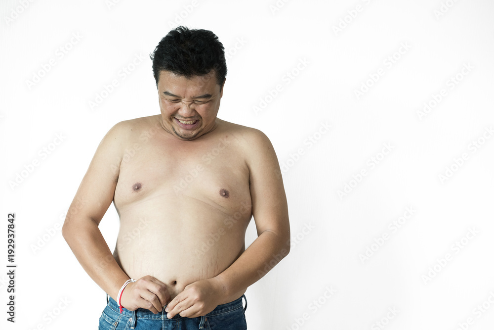 Fototapeta premium Fat man does not wear a shirt,overweight man trying on cloth ,on white backgroun, copy space