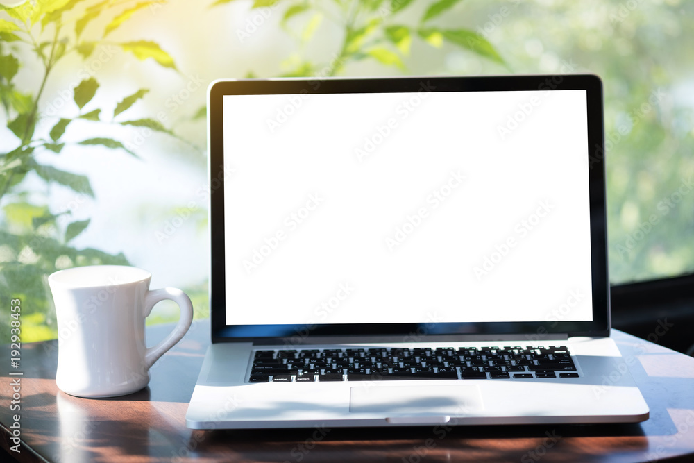 Laptop with blank screen on table. Workspace background new project on laptop computer with blank copy space screen for your advertising text message Laptop with blank screen on table. Workspace background new project on laptop computer with blank copy space screen for your advertising text message