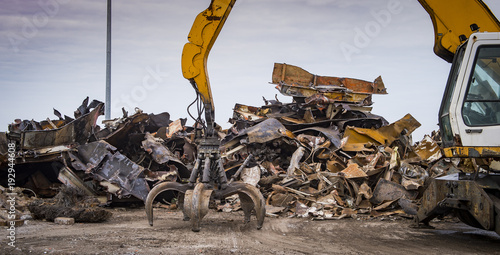 Scrap recycling plant, Crane grabber, pile metal to recycle