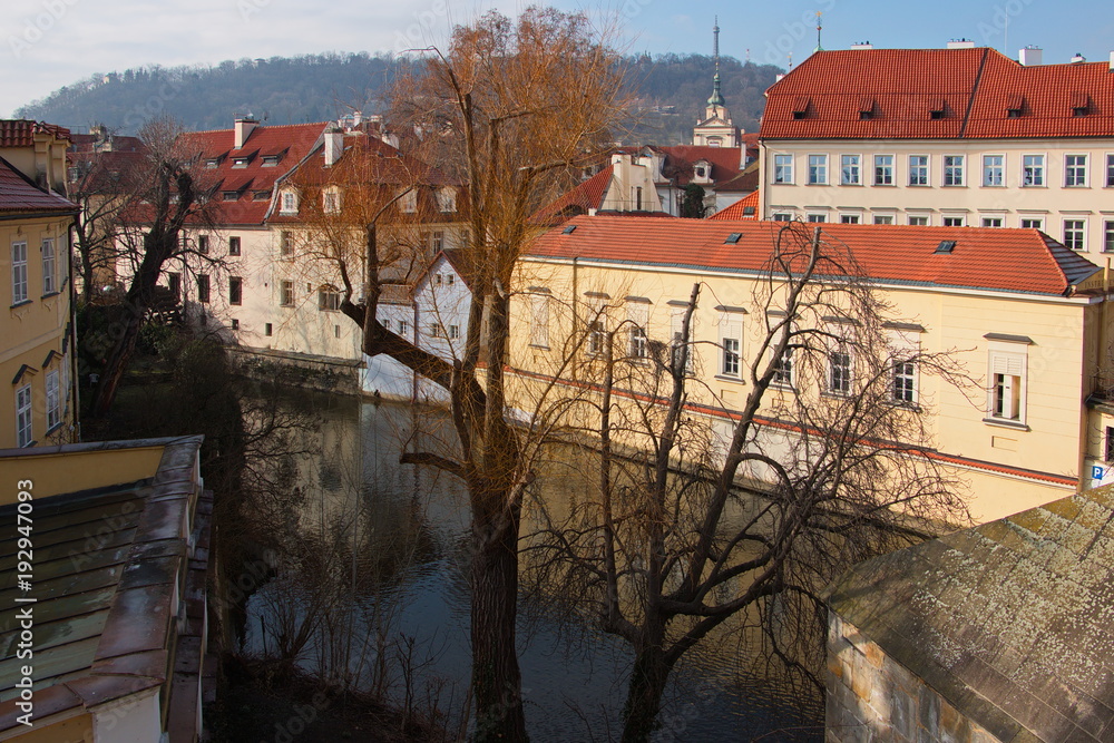View of Certovka and architecture of Lesser Town from Charles Bridge in Prague
