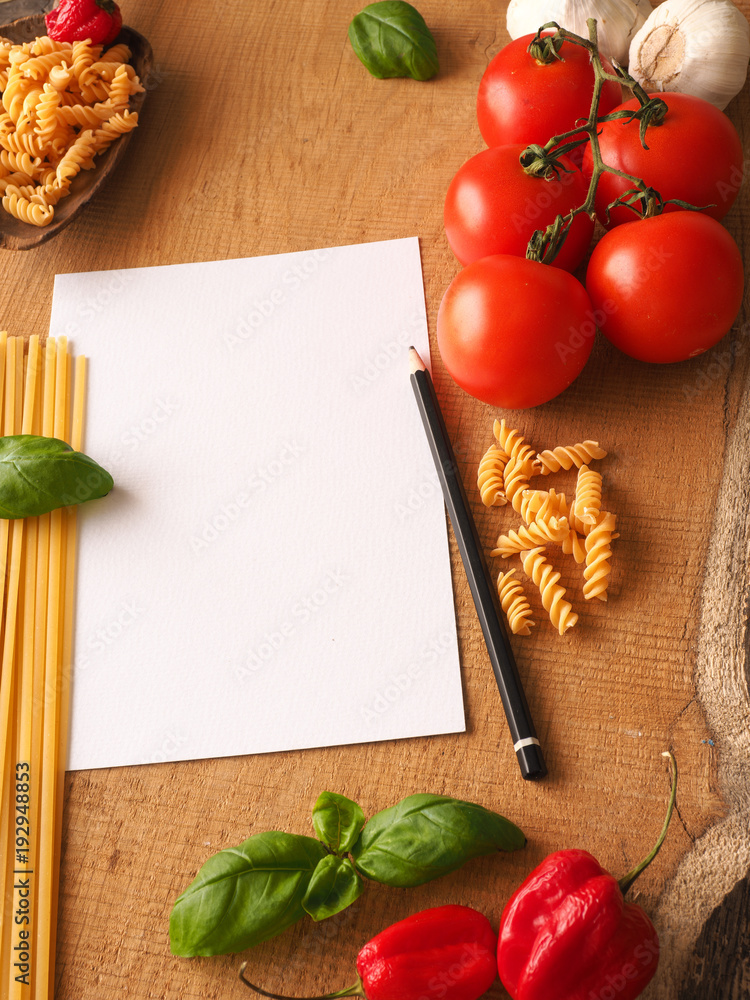 Italian cooking ingredients on a wooden table Italian cooking ingredients on a wooden table