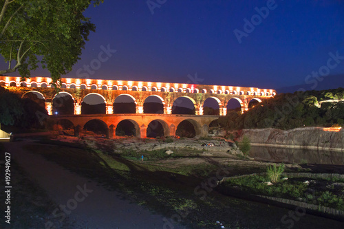 Fényképezés Port de guard, France. Night view of the aqueduct