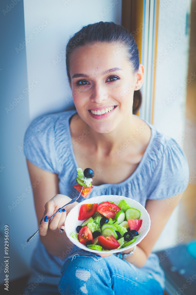 A beautiful girl eating healthy food. Beautiful girl A beautiful girl eating healthy food. Beautiful girl