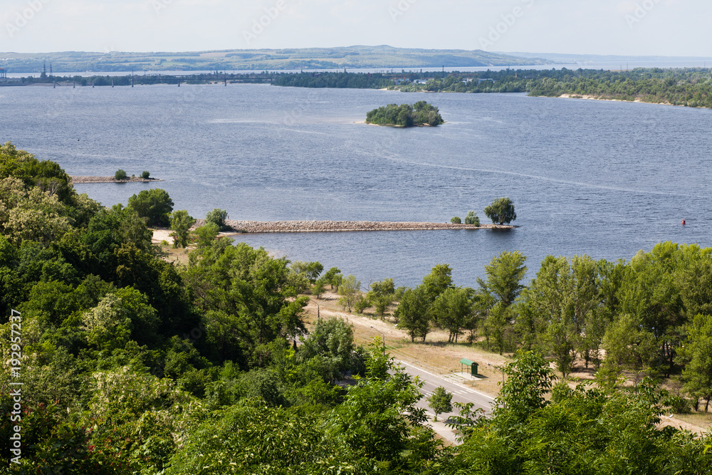 Panoramic view from mountain Tarasova in Kanev, Cherkassy region, on small island and hydroelectric dam on broad Dnieper