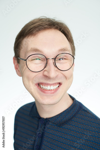 Laughing face of young man