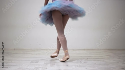 Wallpaper Mural Young ballet dancer training spinning on one leg. Motivated beginner training Torontodigital.ca