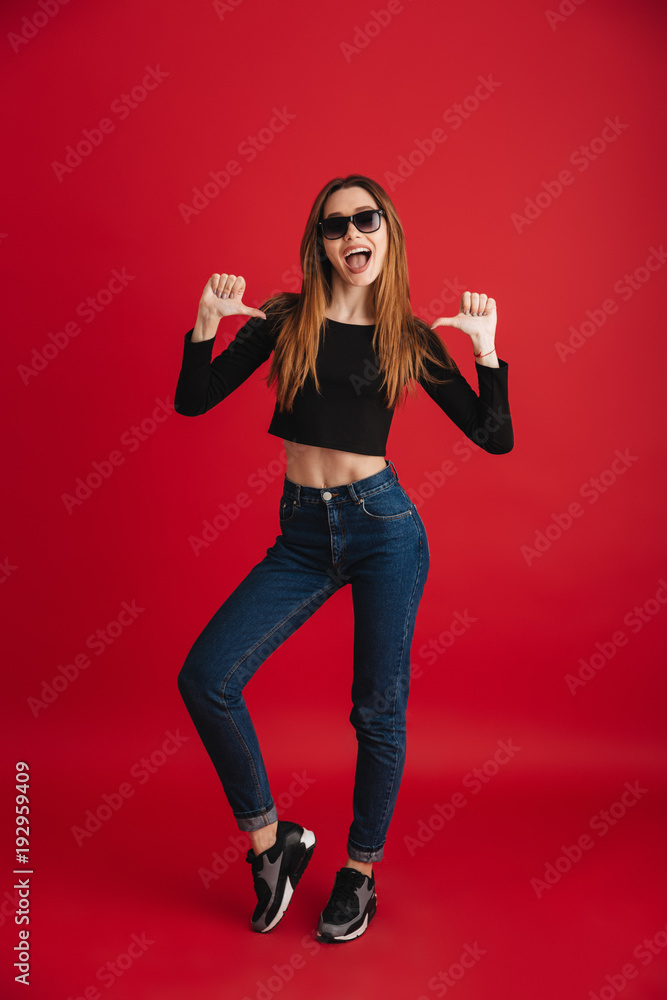 Full length portrait of a cheerful stylish girl Full length portrait of a cheerful stylish girl