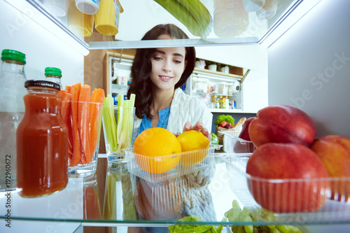 Open refrigerator with fresh fruits and vegetable. Open refrigerator