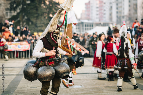 Kukeri (Old Bulgarian pagan traditonal celebration ) in Surva festival, Pernik Bulgaria photo