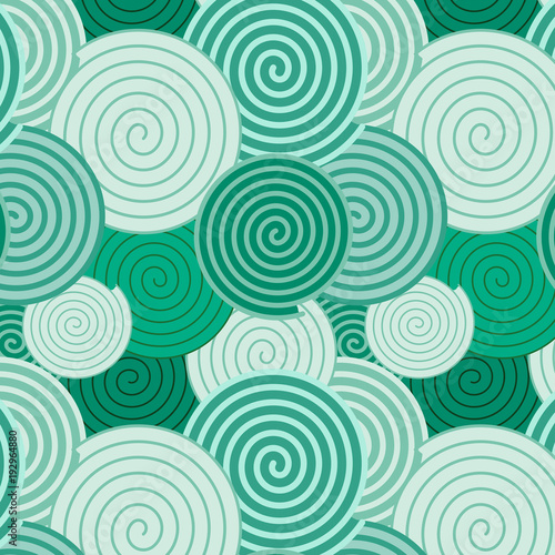 Pattern background. Seamless pattern of spirals in different sizes and green color tones.
