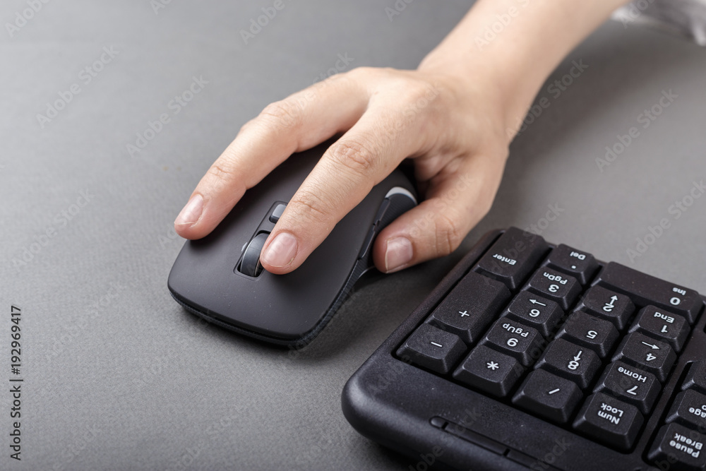 female hands on a mouse