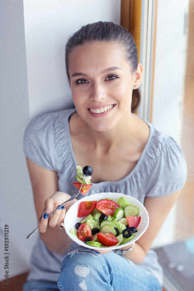 A beautiful girl eating healthy food. Beautiful girl A beautiful girl eating healthy food. Beautiful girl