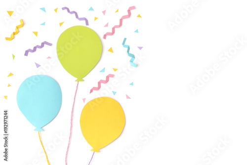 Balloons and confetti paper cut on white background - isolated