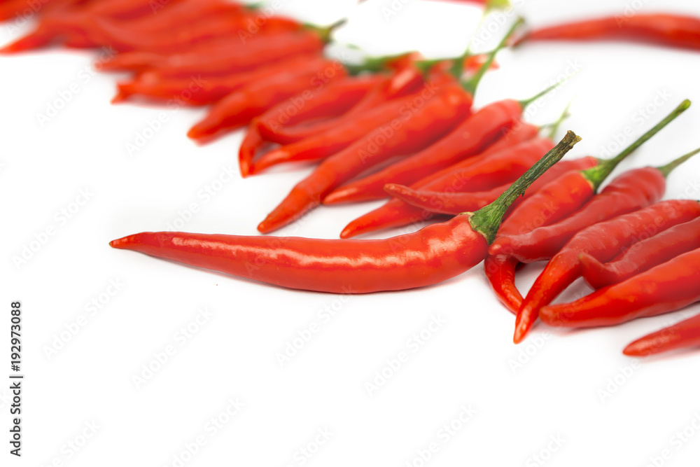 group of hot chili peppers isolated on a white background with green leaf group of hot chili peppers isolated on a white background with green leaf