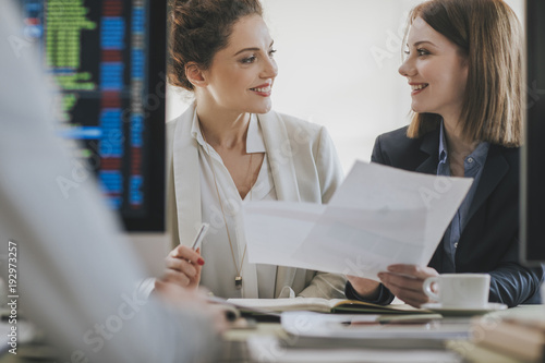 Businesspeople Working at Stock Exchange Market