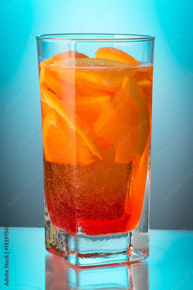 Summer refreshing faintly alcoholic cocktail Aperol spritz in a Summer refreshing faintly alcoholic cocktail Aperol spritz in a