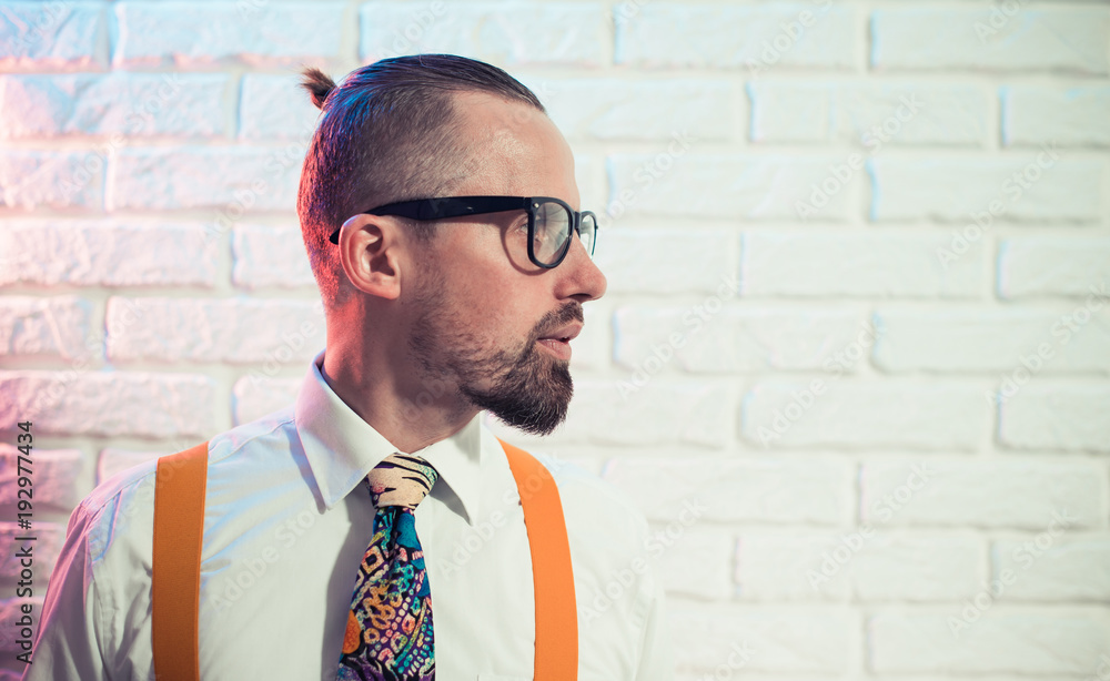 stylish young man in party dress closeup portrait at brick wall stylish young man in party dress closeup portrait at brick wall
