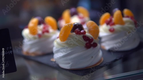 delicious cakes on the shop window photo