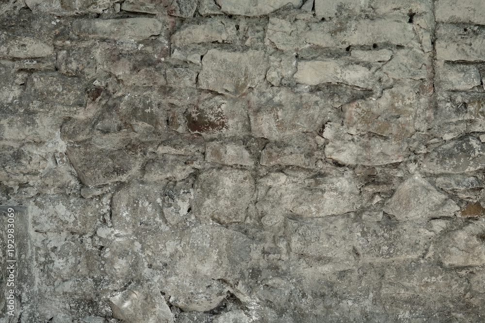 Fototapeta premium Granite texture, stone wall surface closeup