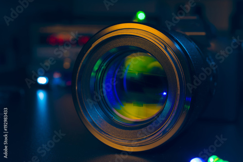 Photo Camera or Video lens close-up on black background DSLR objective