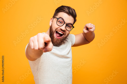 Portrait of a confident bearded man in eyeglasses photo