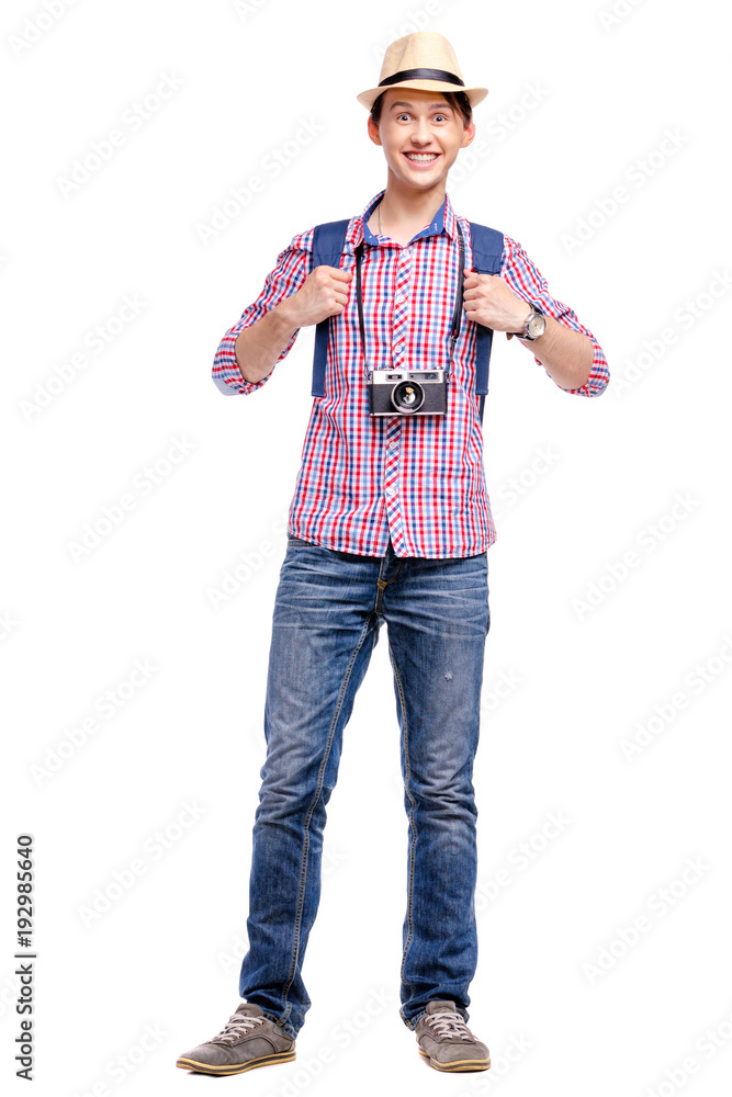Travel concept. Full length studio portrait of handsome young in hat with backpack. Isolated on white. Travel concept. Full length studio portrait of handsome young in hat with backpack. Isolated on white.