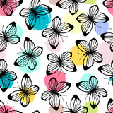 Seamless pattern with butterflies on a polka dot background.