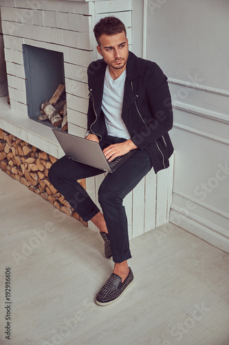 Portrait of a handsome male in a stylish clothing © Fxquadro