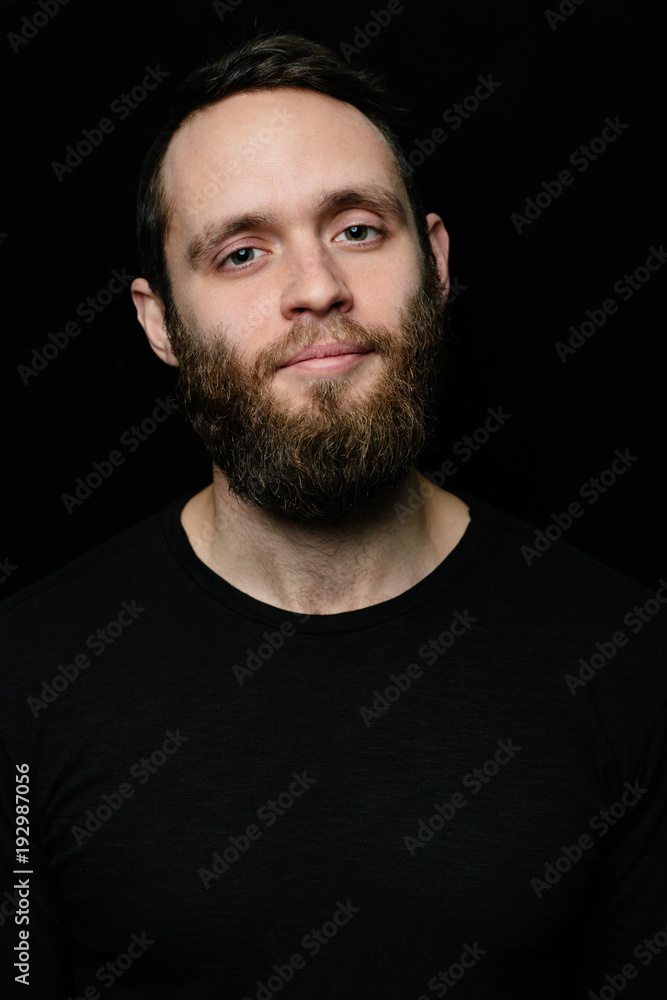 Serious man looking with a little smile Serious man looking with a little smile