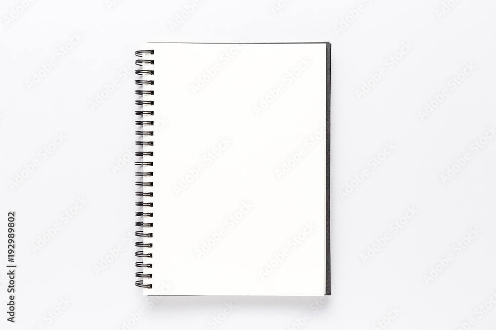 Top view, empty notebook on a white background. Top view, empty notebook on a white background.