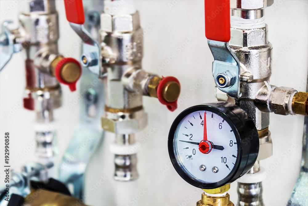 fixture pipes and fittings for connection of water or gas systems. focus on pressure gauge fixture pipes and fittings for connection of water or gas systems. focus on pressure gauge