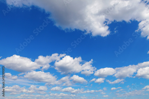 Blue sky with white clouds natural background © lukszczepanski