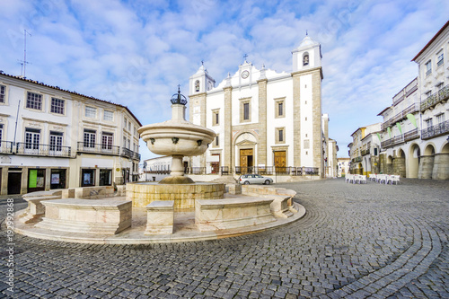 Giraldo Square with fountain and Saint Anton's church, Evora, Alentejo, Portugal photo