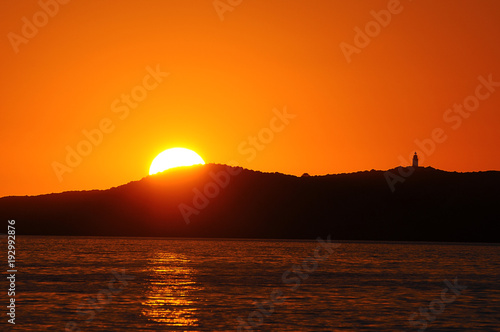 Sunset over the island Illa sa Conillera in Ibiza Spain