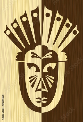 Wood art inlay tile with inverse carved face mask, tribal african motif, light and dark wood photo