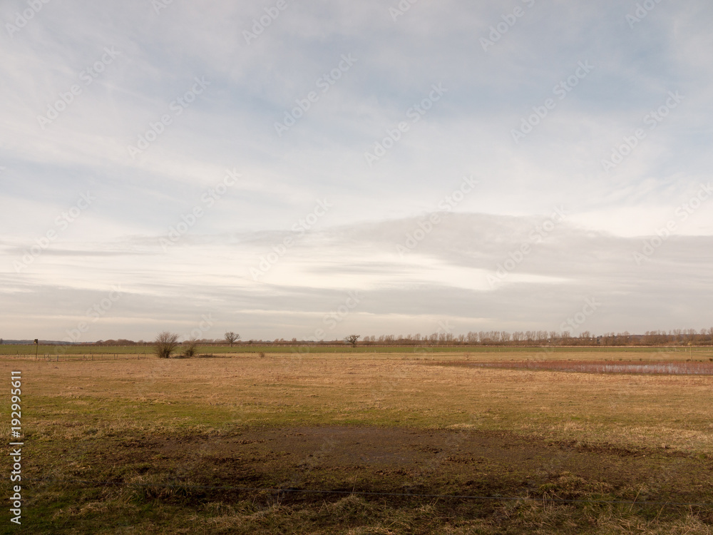 outside open field summer spring day sky clouds plain grass outside open field summer spring day sky clouds plain grass