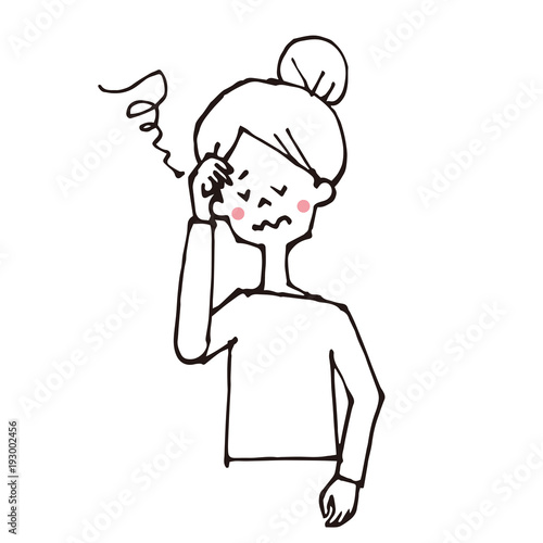 頭をかかえる女性