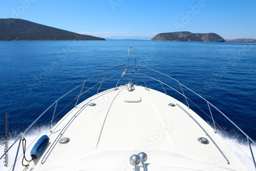 Summer day traveling by the yacht near Spetsopoula and Spetses islands, Saronic Gulf, Greece. © vikakurylo81