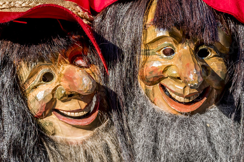 Close-up of two traditional Fasching ,carnical, masks in Germany photo