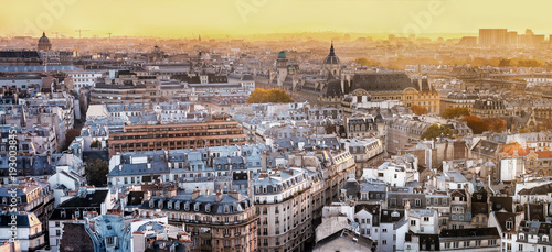 Aerial view of Paris, France at warm sunset.
