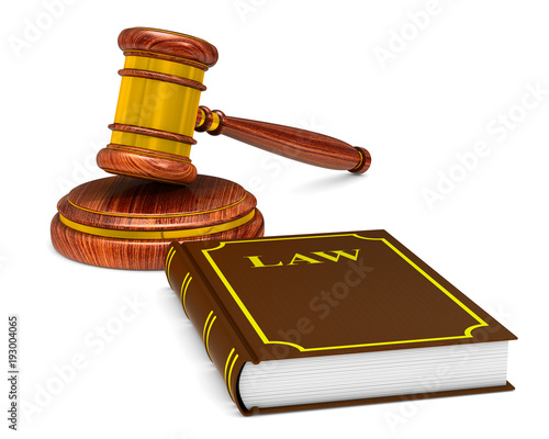 wooden gavel and book on wh...