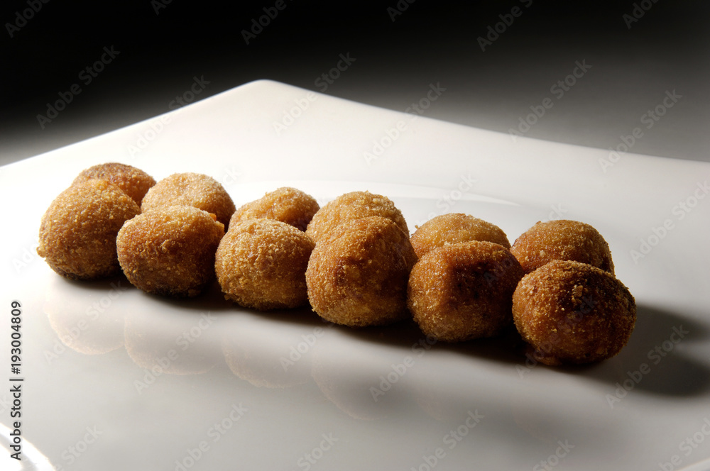 dish with round croquettes dish with round croquettes