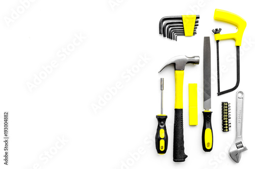 Various repair tools. Must-have for men. Equipment for building. White background top view copy space pattern