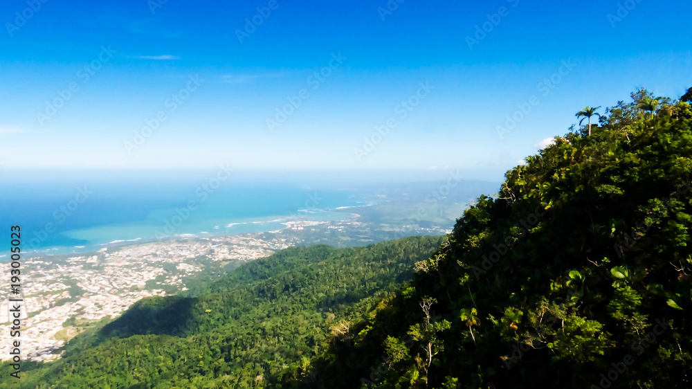 An amazing view of Puerto Plata, the Atlantic Ocean and a lot of tropical trees from the top of Mount Isabel de Torres, Dominican Republic.